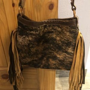 Gorgeous Running Roan Tack cowhide with fringe